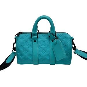 Louis Vuitton blue leather Monogram handbag Taurillon Bandouliere